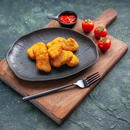 CHICKEN NUGGETS 5 PIS at Burger House SL