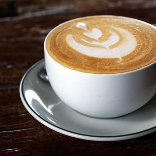 Cafe Latte at Cafe 1959 By Raux Brothers