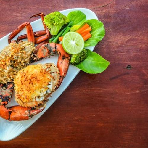 Baked crab served with mashed potato & salad