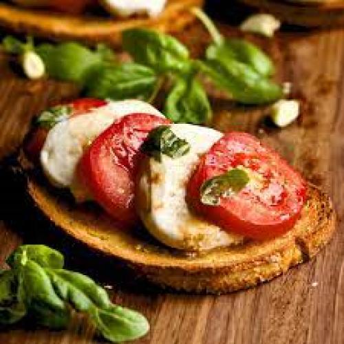 Plum tomato, buffalo mozzarella, fresh basil & balsamic crème at 3Brothers Italian Bistro