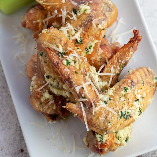Roasted Garlic Butter & Parmesan Parsley Gremolata at Burning Bird