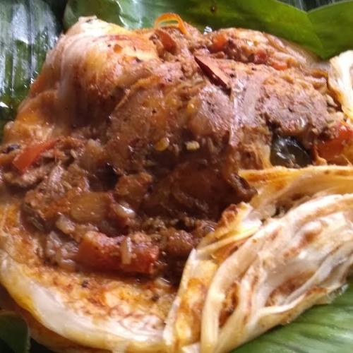 Kerala Style Kizhi Parata (Chicken)