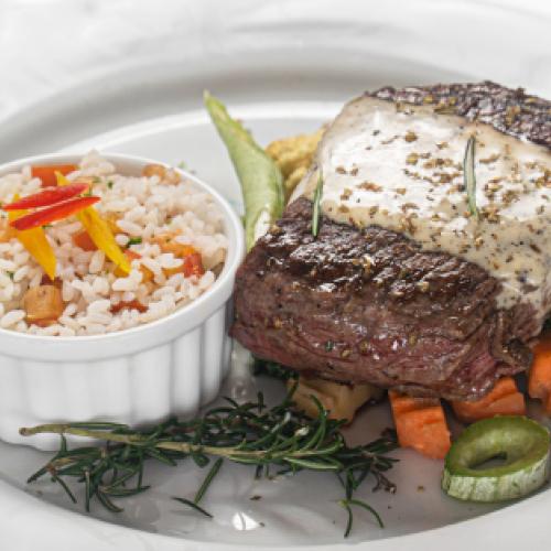 Grilled beef steak  with cheese  cream sauce at TUNA TUNA 33